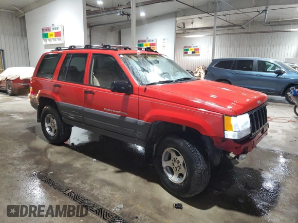 1997 Jeep Grand Cherokee Laredo with VIN 1J4GZ58Y5VC674687, listed as a Copart auction lot 43137095 with 173,228 mi miles and Salvage Title. Bid and sale history available at carsss.com. Image 4.