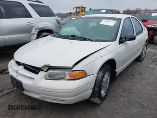 1999 Dodge Stratus z VIN 1B3EJ46X6XN614967, wystawiony jako IAAI lot #41663475 z przebiegiem 130 245 mil mil oraz . Historia ofert i sprzedaży dostępna na DreamBid. Obrazek 2.