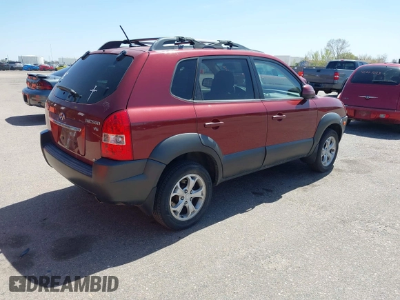 2009 Hyundai Tucson Limited with VIN KM8JN72D79U933958, listed as a IAAI auction lot 42006262 with 143,502 mi miles. Bid and sale history available at carsss.com. Image 4.