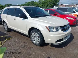 2014 Dodge Journey American Value with VIN 3C4PDCAB2ET104312, listed as a IAAI auction lot 42631996 with 249,426 mi miles and . Bid and sale history available at DreamBid. Image 1.