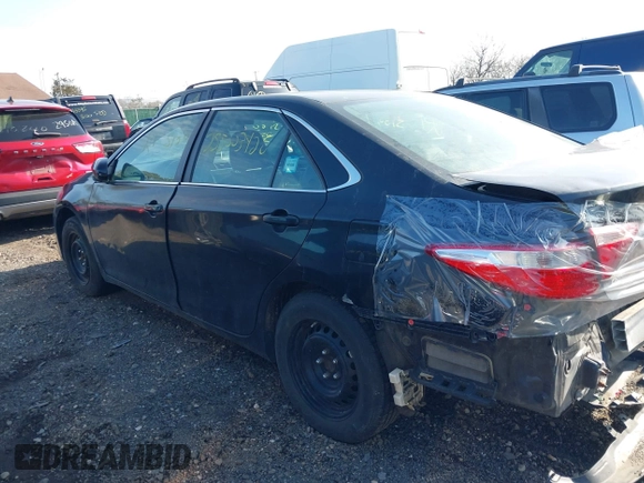 2016 Toyota Camry XLE with VIN 4T4BF1FKXGR549361, listed as a IAAI auction lot 41946584 with 221,775 mi miles and . Bid and sale history available at DreamBid. Image 13.