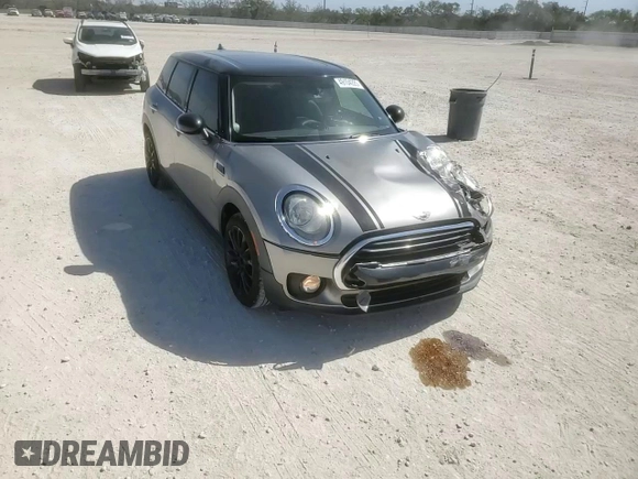 2016 MINI Clubman z VIN WMWLN5C57G2B28303, wystawiony jako Copart lot #56638375 z przebiegiem 130 262 mil mil oraz Szkoda całkowita • Salvage title. Historia ofert i sprzedaży dostępna na DreamBid. Obrazek 11.