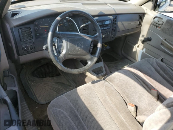 2001 Dodge Dakota z VIN 1B7GL22X21S128774, wystawiony jako Copart lot #58313685 z przebiegiem 167 355 mil mil oraz Czysty tytuł • Clean title. Historia ofert i sprzedaży dostępna na DreamBid. Obrazek 8.