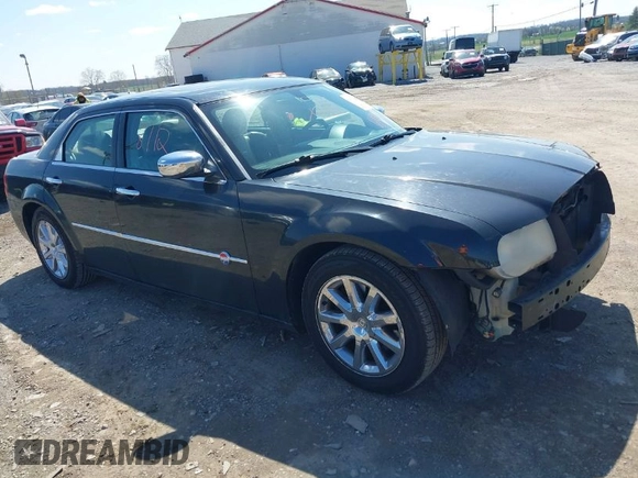 2006 Chrysler 300 C with VIN 2C3LA63H96H490736, listed as a IAAI auction lot 41998112 with 184,090 mi miles. Bid and sale history available at carsss.com. Image 1.