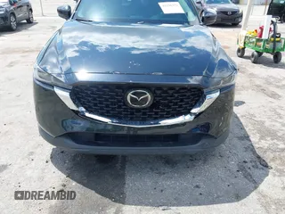 2023 Mazda CX-5 2.5 S Premium Plus Package with VIN JM3KFBEM5P0256652, listed as a IAAI auction lot 41936376 with 31,332 mi miles. Bid and sale history available at carsss.com. Image 6.