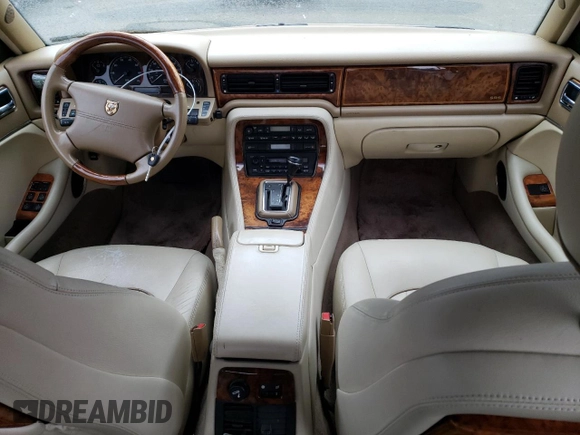 1995 Jaguar XJ with VIN SAJKX1742SC746763, listed as a Copart auction lot 84949964 with Not Provided miles and Clean Title. Bid and sale history available at DreamBid. Image 8.