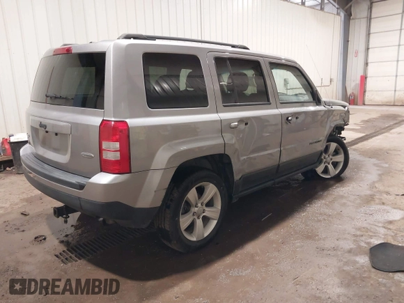 2016 Jeep Patriot Latitude with VIN 1C4NJRFB0GD581213, listed as a IAAI auction lot 42407888 with 104,202 mi miles and . Bid and sale history available at DreamBid. Image 4.