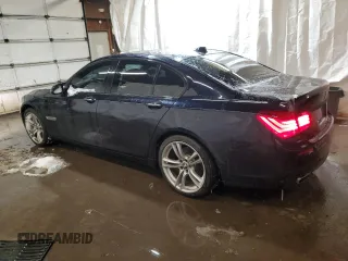 2013 BMW 7 Series 740i with VIN WBAYA6C5XDC995236, listed as a Copart auction lot 41581205 with 121,388 mi miles and Salvage Title. Bid and sale history available at carsss.com. Image 2.
