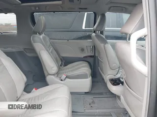 2011 Toyota Sienna XLE AAS with VIN 5TDYK3DC9BS158209, listed as a IAAI auction lot 42163526 with 107,385 mi miles and . Bid and sale history available at DreamBid. Image 8.