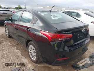 2021 Hyundai Accent SE with VIN 3KPC24A62ME147077, listed as a IAAI auction lot 42013901 with 59,363 mi miles. Bid and sale history available at carsss.com. Image 3.