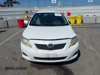 2010 Toyota Corolla with VIN 1NXBU4EE2AZ223753, listed as a IAAI auction lot 42024028 with 204,029 mi miles. Bid and sale history available at carsss.com. Image 12.