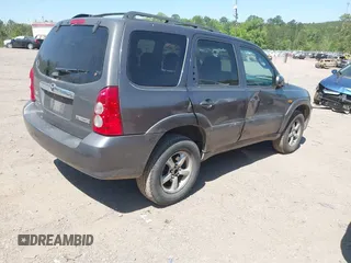 2005 Mazda Tribute S with VIN 4F2YZ04125KM04568, listed as a IAAI auction lot 41973671 with 244,117 mi miles and . Bid and sale history available at carsss.com. Image 4.