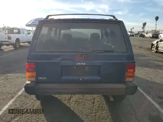 1996 Jeep Cherokee Sport with VIN 1J4FT68S4TL333342, listed as a Copart auction lot 41664965 with 185,199 mi miles and Clean Title. Bid and sale history available at carsss.com. Image 6.