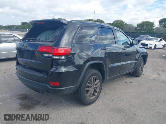 2016 Jeep Grand Cherokee Laredo z VIN 1C4RJEAG6GC436633, wystawiony jako IAAI lot #41567936 z przebiegiem 47 128 mil mil oraz . Historia ofert i sprzedaży dostępna na DreamBid. Obrazek 4.