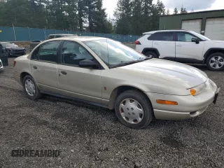 2001 Saturn SL z VIN 1G8ZG52851Z213567, wystawiony jako Copart lot #51795795 z przebiegiem Nie podano mil oraz Szkoda całkowita • Salvage title. Historia ofert i sprzedaży dostępna na DreamBid. Obrazek 4.