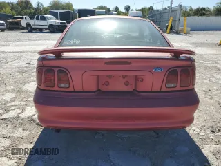 1997 Ford Mustang with VIN 1FALP4043VF109078, listed as a Copart auction lot 74601704 with 133,838 mi miles and Salvage Title. Bid and sale history available at carsss.com. Image 6.