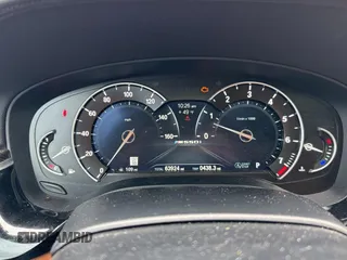 2018 BMW 5 Series M550i xDrive with VIN WBAJB9C57JB035521, listed as a Copart auction lot 54177125 with 63,924 mi miles and Clean Title. Bid and sale history available at carsss.com. Image 8.