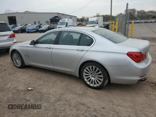 2012 BMW 7 Series 750i xDrive with VIN WBAKC6C55CC396517, listed as a Copart auction lot 53300945 with 163,700 mi miles and Clean Title. Bid and sale history available at carsss.com. Image 2.