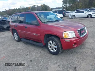 2004 GMC Envoy SLE with VIN 1GKDT13S942344209, listed as a IAAI auction lot 40727827 with 181,072 mi miles. Bid and sale history available at carsss.com. Image 1.