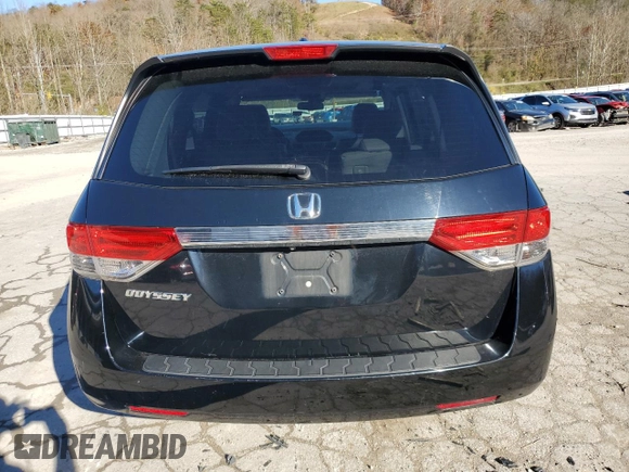 2014 Honda Odyssey EX-L with VIN 5FNRL5H69EB121140, listed as a Copart auction lot 79698724 with 169,626 mi miles and Salvage Title. Bid and sale history available at DreamBid. Image 6.