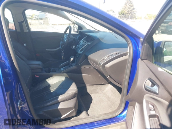 2013 Ford Focus SE z VIN 1FADP3F28DL178210, wystawiony jako IAAI lot #42199073 z przebiegiem 110 542 mil mil oraz . Historia ofert i sprzedaży dostępna na DreamBid. Obrazek 5.