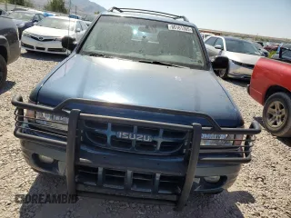 2001 Isuzu Rodeo S z VIN 4S2DM58W014344342, wystawiony jako Copart lot #60161365 z przebiegiem Nie podano mil oraz Czysty tytuł • Clean title. Historia ofert i sprzedaży dostępna na DreamBid. Obrazek 5.
