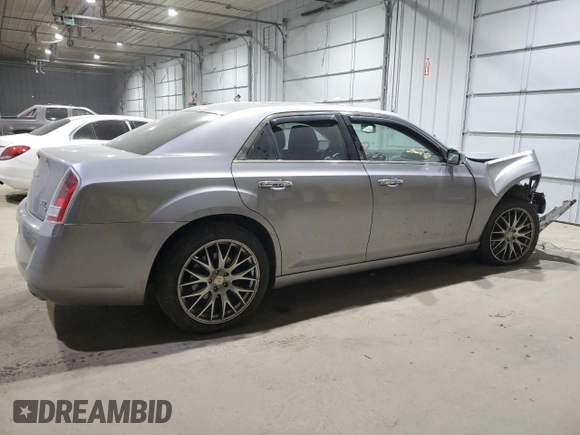 2014 Chrysler 300 C with VIN 2C3CCAKTXEH383941, listed as a Copart auction lot 41703475 with 105,709 mi miles and Salvage Title. Bid and sale history available at DreamBid. Image 3.