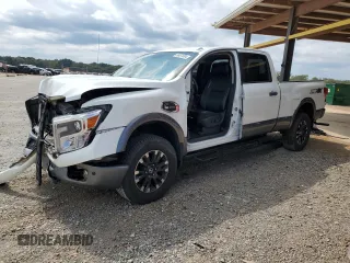 2018 Nissan Titan Platinum Reserve with VIN 1N6BA1F49JN521225, listed as a Copart auction lot 69831004 with 92,536 mi miles and Salvage title. Bid and sale history available at DreamBid. Image 1.
