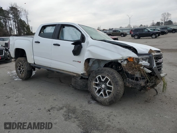 2022 GMC Canyon 4WD AT4 w/Cloth with VIN 1GTG6FEN5N1155598, listed as a Copart auction lot 41970495 with 57,572 mi miles and Salvage Title. Bid and sale history available at carsss.com. Image 4.