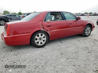 2006 Cadillac DTS 1SC z VIN 1G6KD57Y46U237570, wystawiony jako Copart lot #57211675 z przebiegiem 95 732 mil mil oraz Szkoda całkowita • Salvage title. Historia ofert i sprzedaży dostępna na DreamBid. Obrazek 3.
