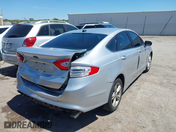 2015 Ford Fusion SE with VIN 3FA6P0H70FR229316, listed as a IAAI auction lot 42081286 with 185,294 mi miles and . Bid and sale history available at DreamBid. Image 4.