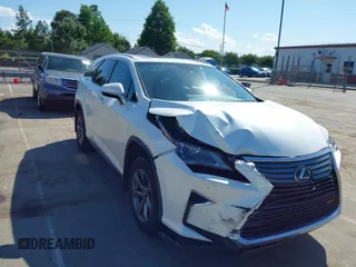 2018 Lexus RX 350L Premium z VIN JTJDZKCAXJ2006088, wystawiony jako IAAI lot #42332914 z przebiegiem 104 393 mil mil oraz . Historia ofert i sprzedaży dostępna na DreamBid. Obrazek 1.