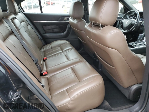 2016 Lincoln MKS z VIN 1LNHL9DK5GG602626, wystawiony jako Copart lot #50748125 z przebiegiem 118 884 mil mil oraz Szkoda całkowita • Salvage title. Historia ofert i sprzedaży dostępna na DreamBid. Obrazek 10.