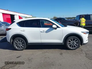 2021 Mazda CX-5 Grand Touring with VIN JM3KFBDM6M0483135, listed as a IAAI auction lot 41590430 with 33,466 mi miles. Bid and sale history available at carsss.com. Image 13.