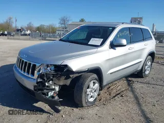 2013 Jeep Grand Cherokee Laredo with VIN 1C4RJFAG3DC586667, listed as a IAAI auction lot 42041524 with 100,635 mi miles. Bid and sale history available at carsss.com. Image 18.