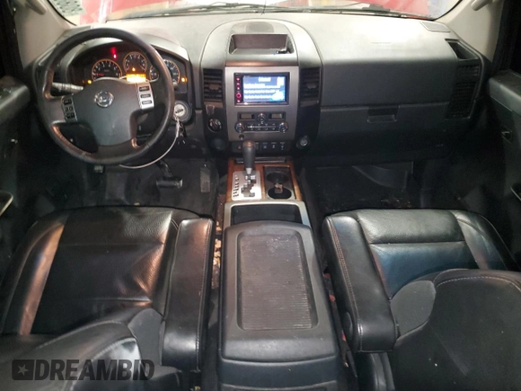 2012 Nissan Titan SV with VIN 1N6BA0EC6CN321585, listed as a Copart auction lot 80860004 with 141,092 mi miles and Salvage Title. Bid and sale history available at carsss.com. Image 8.