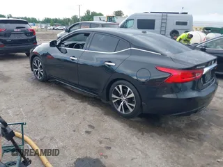 2017 Nissan Maxima SV z VIN 1N4AA6AP1HC364881, wystawiony jako IAAI lot #42251177 z przebiegiem 148 210 mil mil oraz . Historia ofert i sprzedaży dostępna na DreamBid. Obrazek 3.