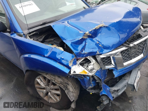 2015 Nissan Frontier SV z VIN 1N6AD0FRXFN758919, wystawiony jako IAAI lot #41909985 z przebiegiem 153 001 mil mil oraz . Historia ofert i sprzedaży dostępna na DreamBid. Obrazek 19.