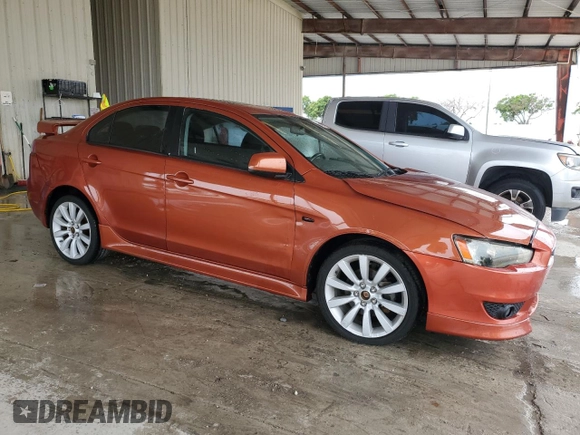 2010 Mitsubishi Lancer GTS with VIN JA32U8FW3AU022400, listed as a Copart auction lot 72569714 with 147,440 mi miles and Salvage Title. Bid and sale history available at carsss.com. Image 4.