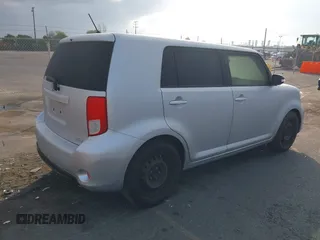 2015 Scion xB with VIN JTLZE4FE0FJ081849, listed as a IAAI auction lot 41425639 with 93,596 mi miles. Bid and sale history available at carsss.com. Image 4.