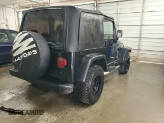 1997 Jeep Wrangler Sport with VIN 1J4FY19S6VP457417, listed as a Copart auction lot 52110535 with 106,129 mi miles and Salvage Title. Bid and sale history available at carsss.com. Image 3.