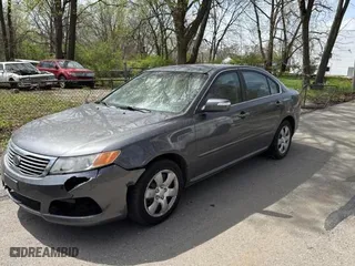 2009 Kia Optima LX with VIN KNAGE228695323268, listed as a Copart auction lot 51813365 with 99,447 mi miles and Clean Title. Bid and sale history available at carsss.com. Image 1.