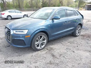 2018 Audi Q3 Premium Plus z VIN WA1JCCFS8JR014631, wystawiony jako IAAI lot #41958696 z przebiegiem 94 063 mil mil oraz . Historia ofert i sprzedaży dostępna na DreamBid. Obrazek 2.