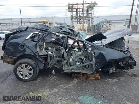 2015 Cadillac SRX with VIN 3GYFNAE36FS573940, listed as a IAAI auction lot 41808779 with Not Provided miles and . Bid and sale history available at DreamBid. Image 12.