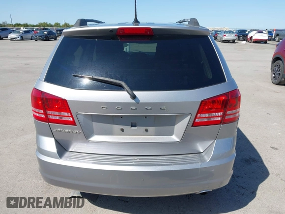 2017 Dodge Journey SE z VIN 3C4PDCAB1HT573511, wystawiony jako IAAI lot #41984865 z przebiegiem 128 721 mil mil oraz . Historia ofert i sprzedaży dostępna na DreamBid. Obrazek 16.