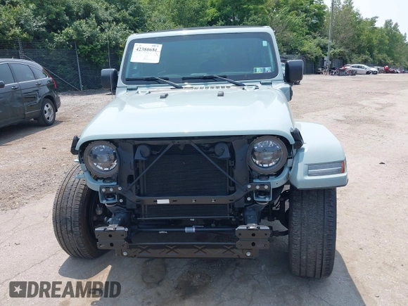 2023 Jeep Wrangler Sahara with VIN 1C4JJXP6XPW554741, listed as a IAAI auction lot 42380681 with 15,148 mi miles and . Bid and sale history available at DreamBid. Image 13.