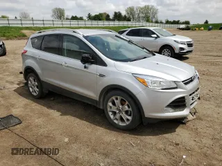 2015 Ford Escape Titanium с VIN 1FMCU0JX7FUA49724, выставлен на аукционе Copart как лот 56676655 с пробегом 85 402 миль миль и Чистый • Clean title. История ставок и продаж доступна на DreamBid. Изображение 4.