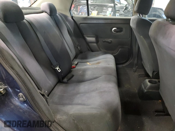 2009 Nissan Versa 1.6 with VIN 3N1CC11E49L458857, listed as a Copart auction lot 59195275 with 100,351 mi miles and Salvage title. Bid and sale history available at DreamBid. Image 10.