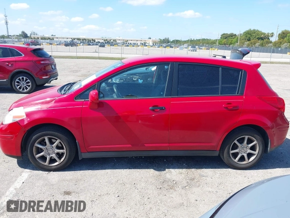 2009 Nissan Versa S with VIN 3N1BC13E69L500633, listed as a IAAI auction lot 42137113 with 193,491 mi miles and . Bid and sale history available at carsss.com. Image 14.