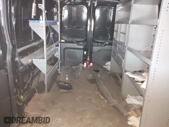2016 Ford Transit Cargo z VIN 1FTYR2CM0GKB51759, wystawiony jako IAAI lot #41602091 z przebiegiem 158 997 mil mil oraz . Historia ofert i sprzedaży dostępna na DreamBid. Obrazek 8.